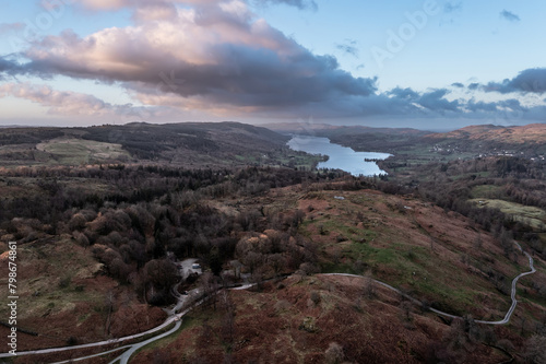 Beautiful, aerial drone landscape image of Lake District during Spring vibrant sunset