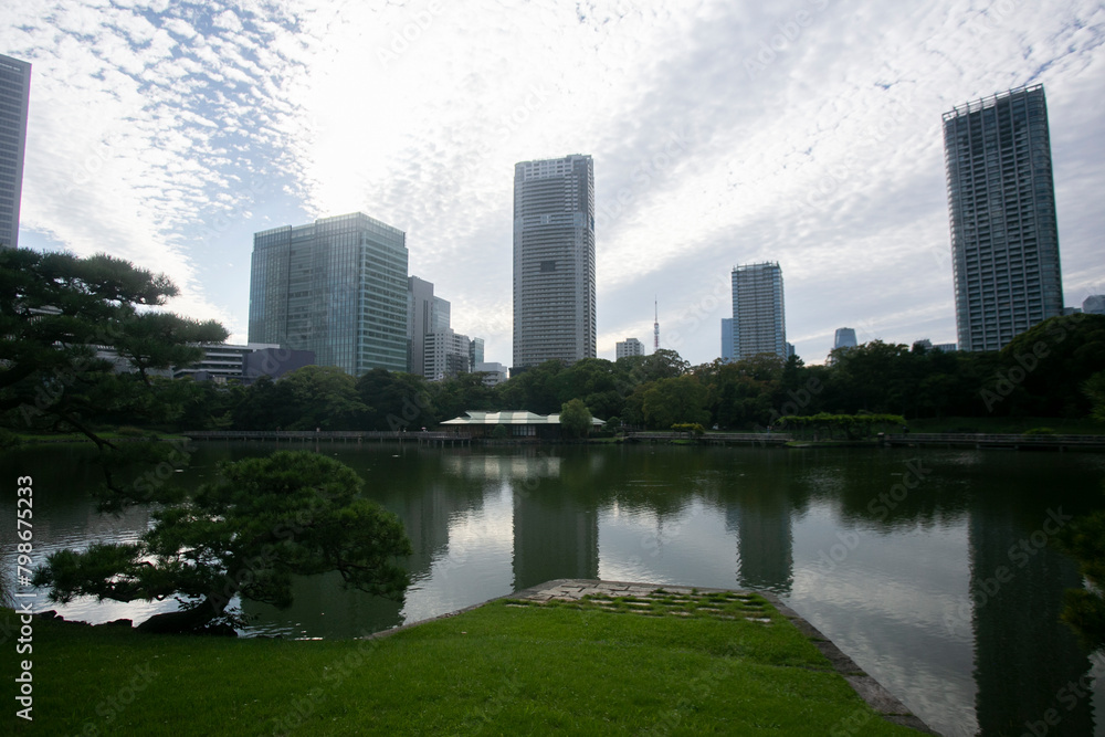 The Gardens of Hamarikyu are a public park in Chūō, Tokyo, Japan. Located at the mouth of the Sumida River they are surrounded by modern buildings. The Gardens of Hamarikyu are a public park in Chūō, Tokyo, Japan. Located at the mouth of the Sumida River they are surrounded by modern buildings.