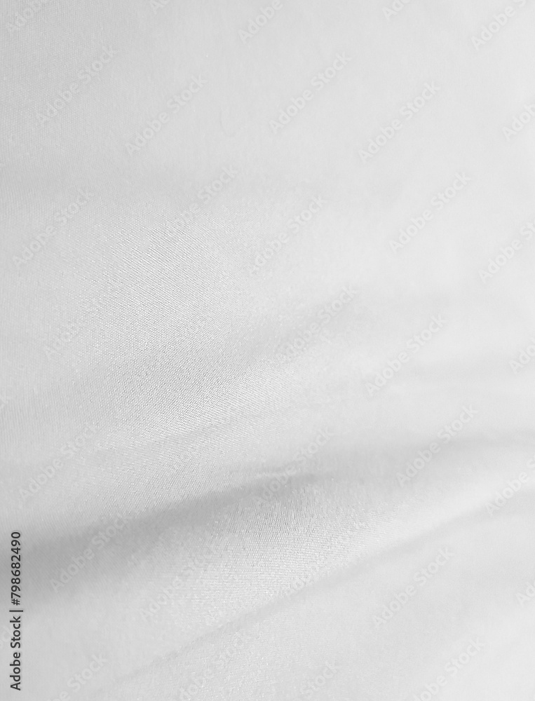 Obraz premium Soft white wrinkled fabric for graphic design or wallpaper