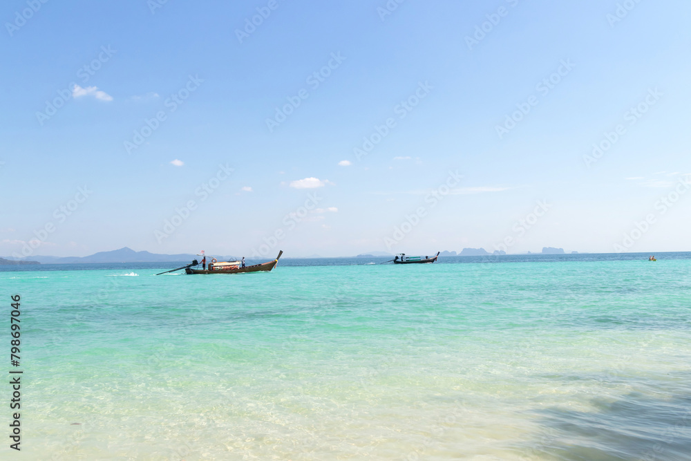 Crystal clear water and a very interesting snorkeling reef, that is swimmable from the beach at Koh Kradan in Trang, Thailand. 