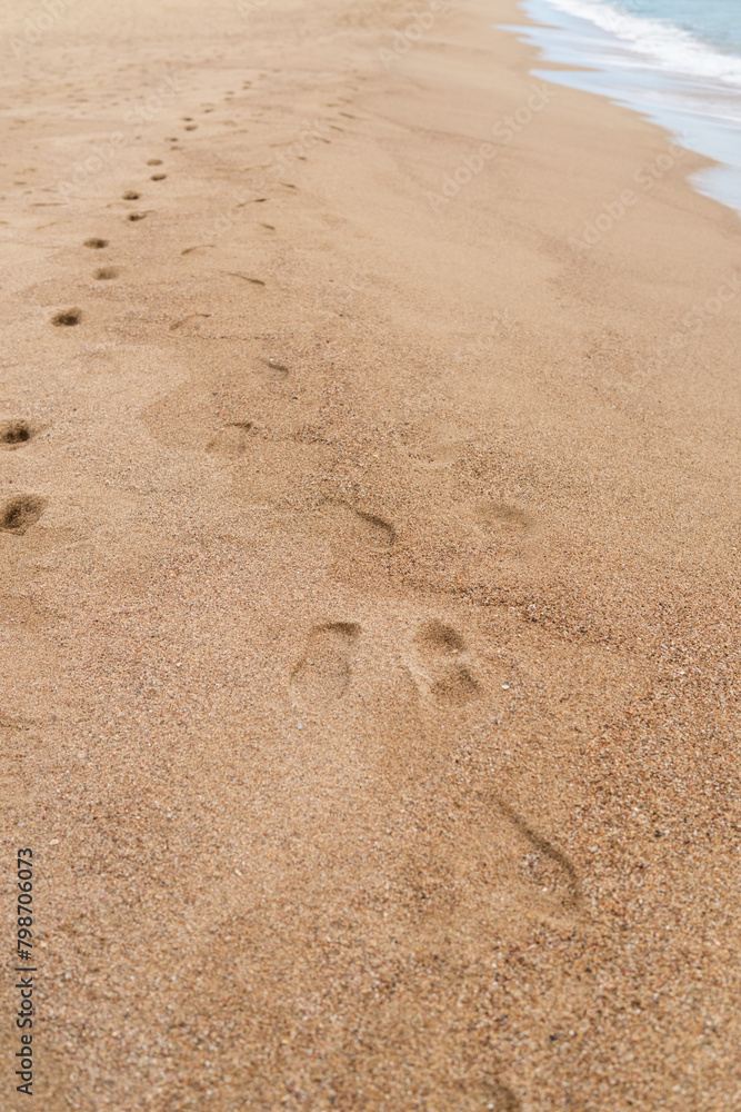 Sandy beach with small waves background Sandy beach with small waves background
