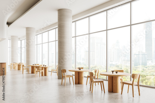 Modern cafe interior with wooden tables and chairs by large windows overlooking a cityscape, minimalist design, 3D Rendering.