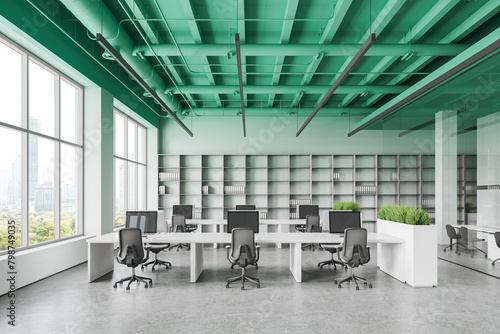 Green office interior with desks and armchairs in row  panoramic window