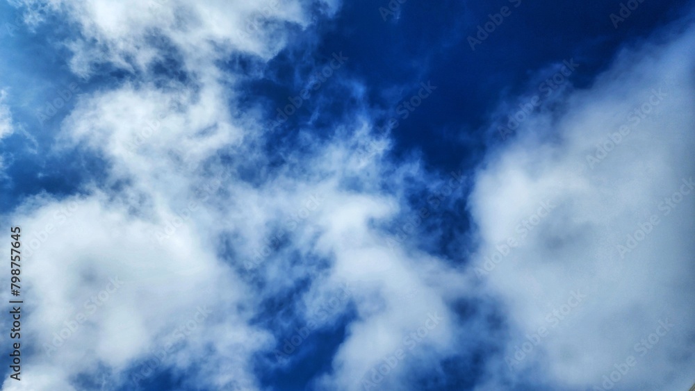 Obraz premium Blue sky background with white clouds. Sky background with white clouds.