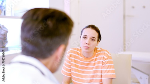 Female patient listening attentively to the doctor