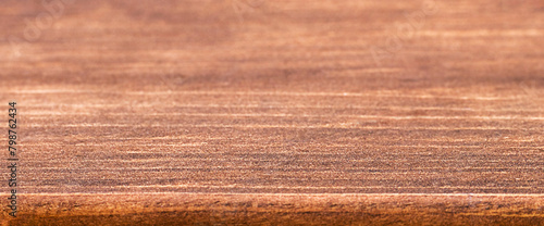 The texture of a wooden surface close-up.