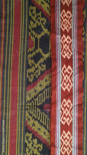 Handmade woven textile from Indonesia, textured ethnic fabric background © Wahjoekris