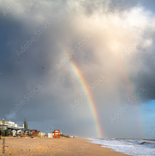 Arco íris na praia