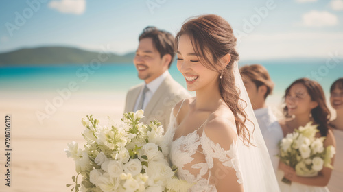 Fototapeta Naklejka Na Ścianę i Meble -  bride and groom are smiling and posing for a picture on a beach