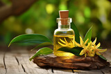 A bottle of Ylang-Ylang aromatherapy essential oil on natural background