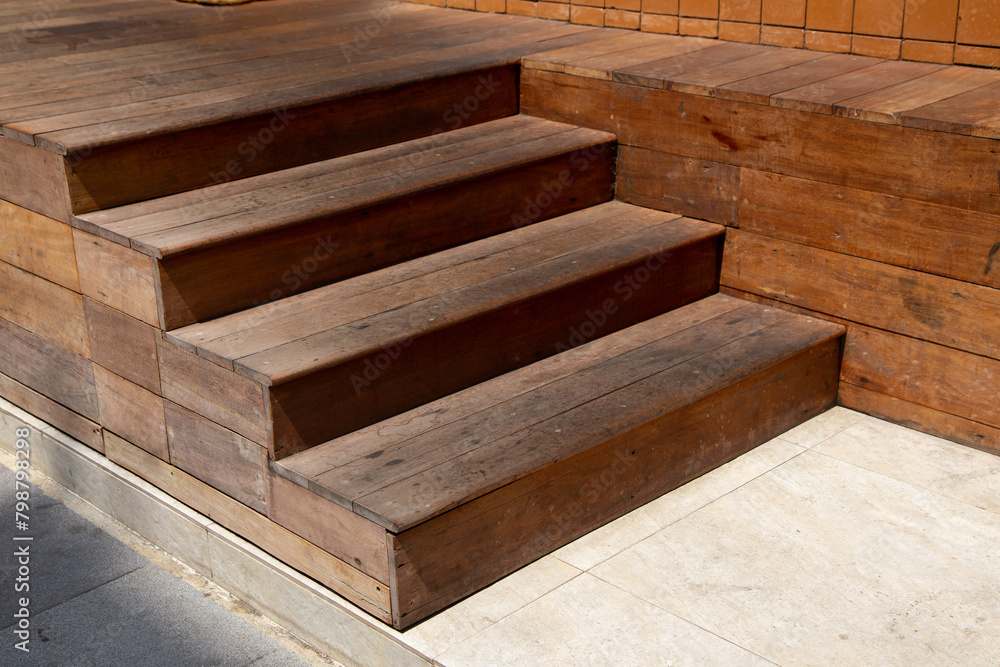 Brown wooden steps Stay outside in sunlight. Brown wooden steps Stay outside in sunlight.