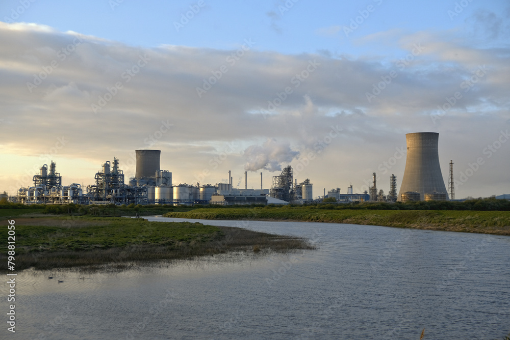 HDR Oil refinery, cooling towers, with smoke. HDR Oil refinery, cooling towers, with smoke.