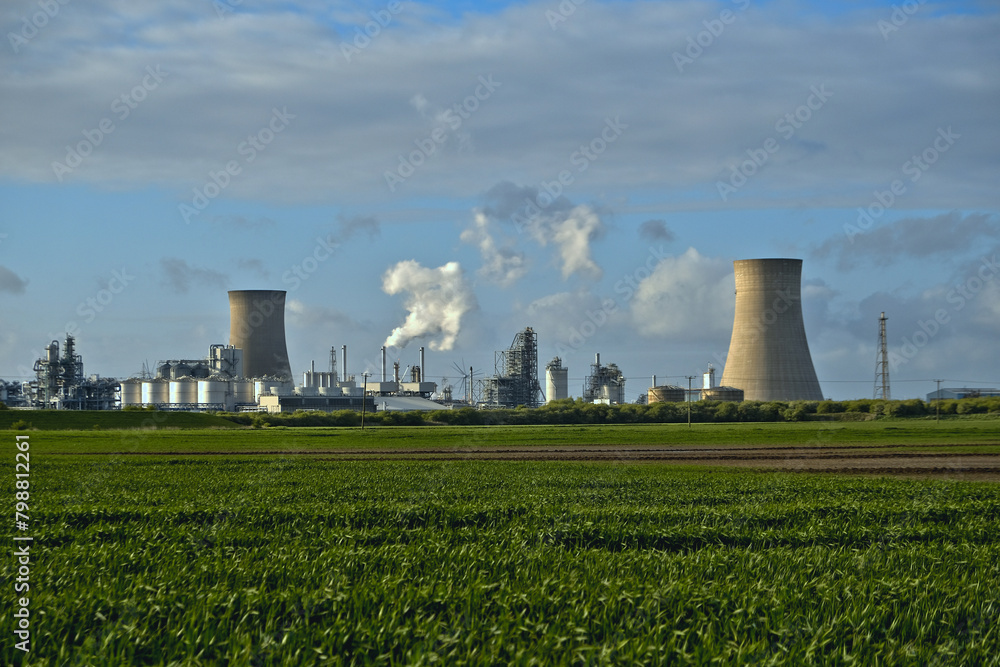 HDR Oil refinery, cooling towers, with smoke. HDR Oil refinery, cooling towers, with smoke.