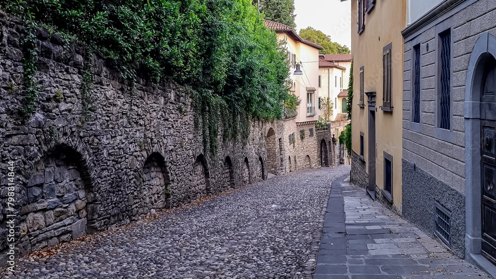 ﻿Ancient residential district with historic architecture and charming alleys in a small rural village in Bergamo, Lombardy, Northern Italy, Europe. Medieval buildings with Mediterranean flair