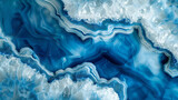 High-definition pearlescent white and deep blue swirling alcohol ink with agate effects.