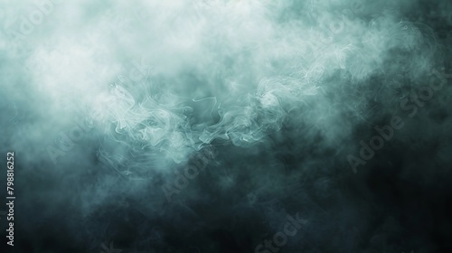 A blurry image of smoke with a dark background. The smoke is thick and dense, creating a sense of heaviness and darkness. The image evokes a feeling of unease and discomfort