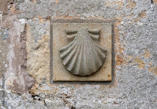 Scallop shell symbol on a church along the Camino de Santiago pilgrimage trail