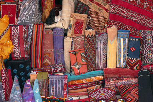 Moroccan carpets and rugs, handwoven by the berber tribes on display. Variety of carpets styles, patterns and colors. © DOCKSTUCK