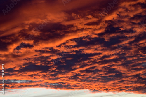 dramatic Red clouds for pattern background. A burning sky in a horror movie. crimson storm in apocalyptic  judgment day.