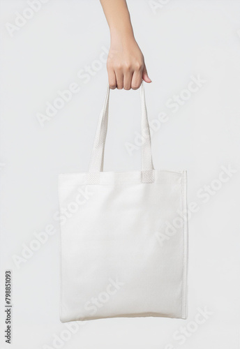 Shopper mockup in a woman's hand.