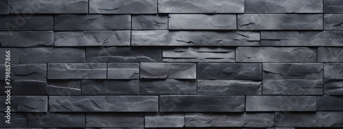 The ceramic tile in brick wall pattern design with dark grey tone