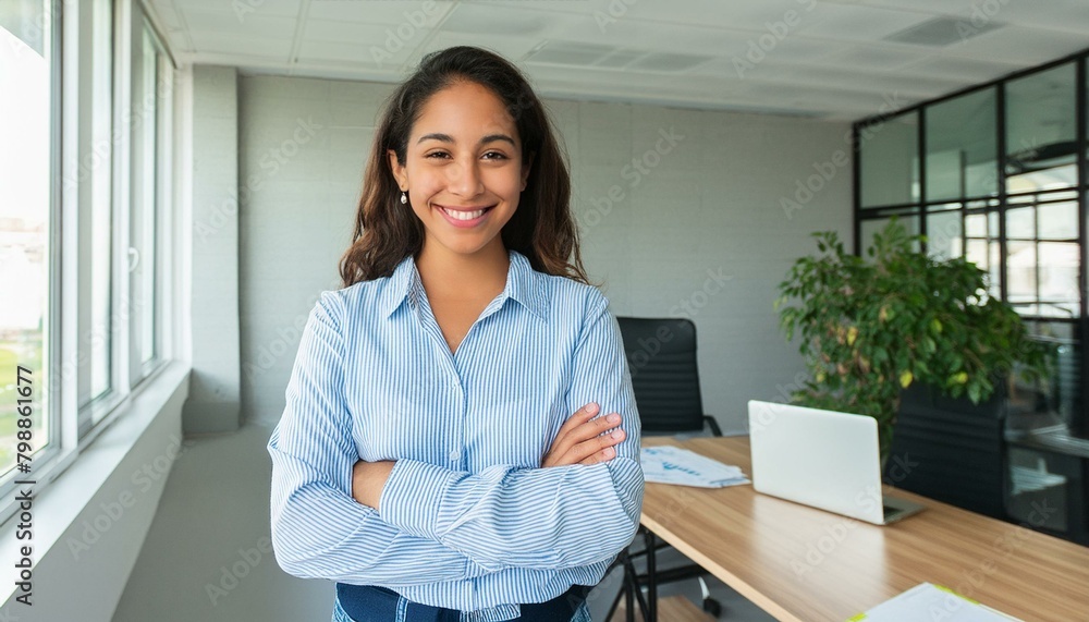 successful business woman, boss in shirt smiling and looking at camera in office with crossed arms on chest; professional manager concept successful business woman, boss in shirt smiling and looking at camera in office with crossed arms on chest; professional manager concept