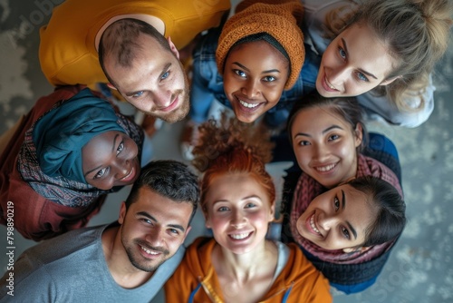 Diverse group of happy young people looking up and smiling at camera. Smiling faces of multi cultural and multi generation people. High angle indoor shot, view from, Generative AI