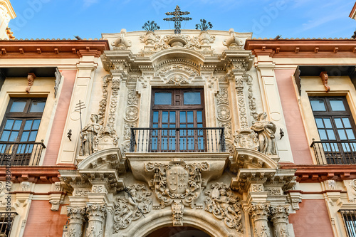 Medieval architecture in the facade of the Archbishop's Palace in Seville, Spain
