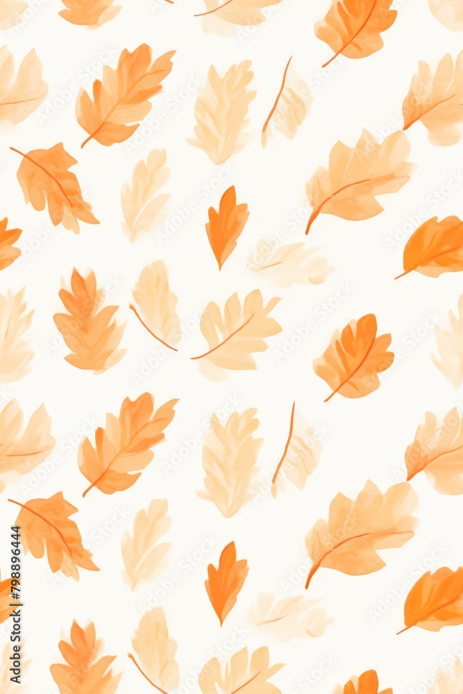 A pattern of orange leaves is spread across a white background