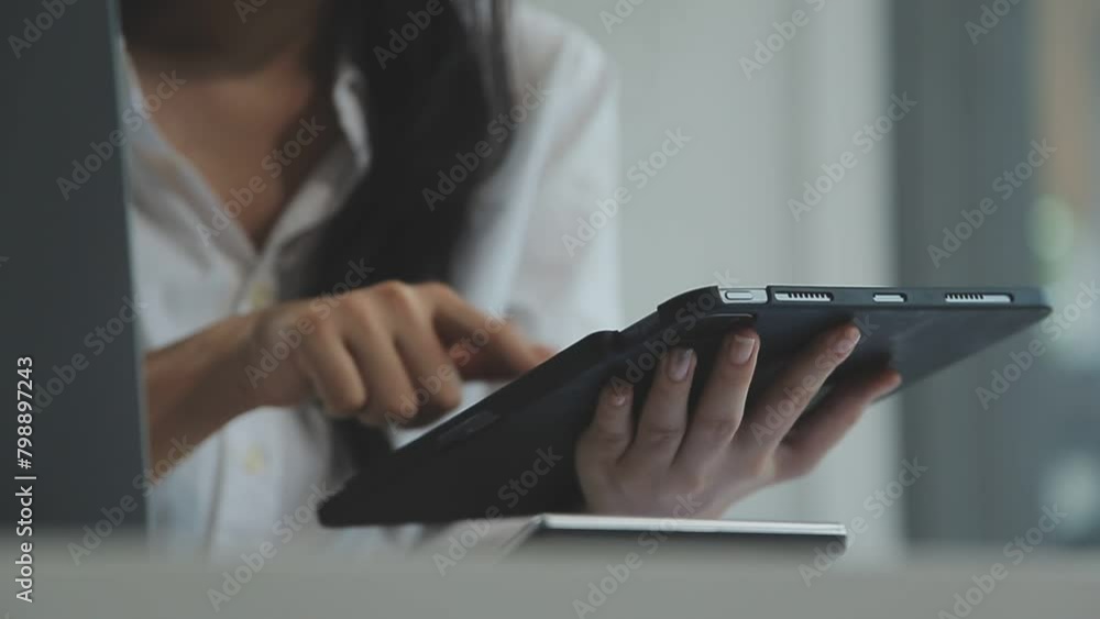 Young architect work project. Photo woman working with new startup project in modern loft. Generic design notebook on wood table. Horizontal, film effect Young architect work project. Photo woman working with new startup project in modern loft. Generic design notebook on wood table. Horizontal, film effect