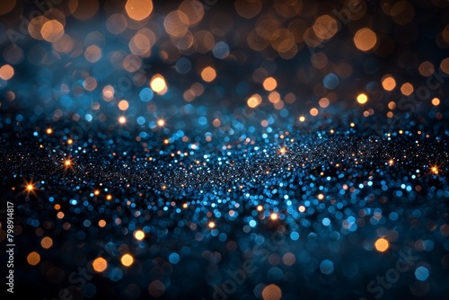 Glittering background with bokeh defocused lights and stars. Blue Glitter Background for Black Friday, Christmas or Special Occasion 