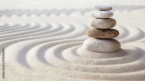 Stone for meditation in the Japanese Zen garden, sand and stones for harmony and balance.