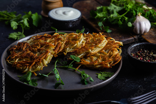 Potato pancakes with garlic sauce. Draniki