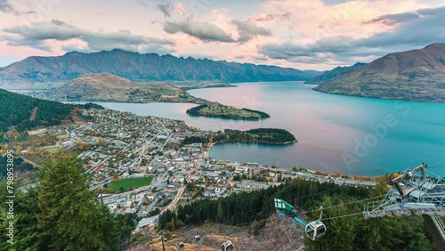 Viewpoint of Queenstown city with lake wakatipu and gondola station in the sunset at New Zealand photo