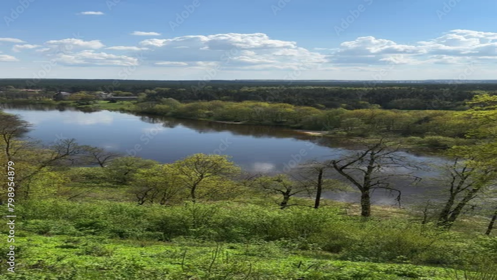 View of Neris River from Observation Deck in Verkiai Regional Park in Vilnius, Lithuania. Vertical video View of Neris River from Observation Deck in Verkiai Regional Park in Vilnius, Lithuania. Vertical video