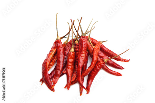 Dried red chillies isolated on white background. Concept, food ingredient for cooking or seasoning food to have hot and spicy taste. Processed from fresh red chilies by drying them in the sun.        