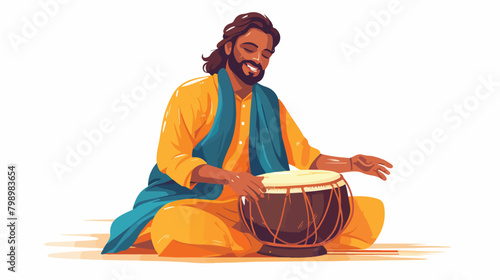 Indian musician playing big dholak drum with sticks photo