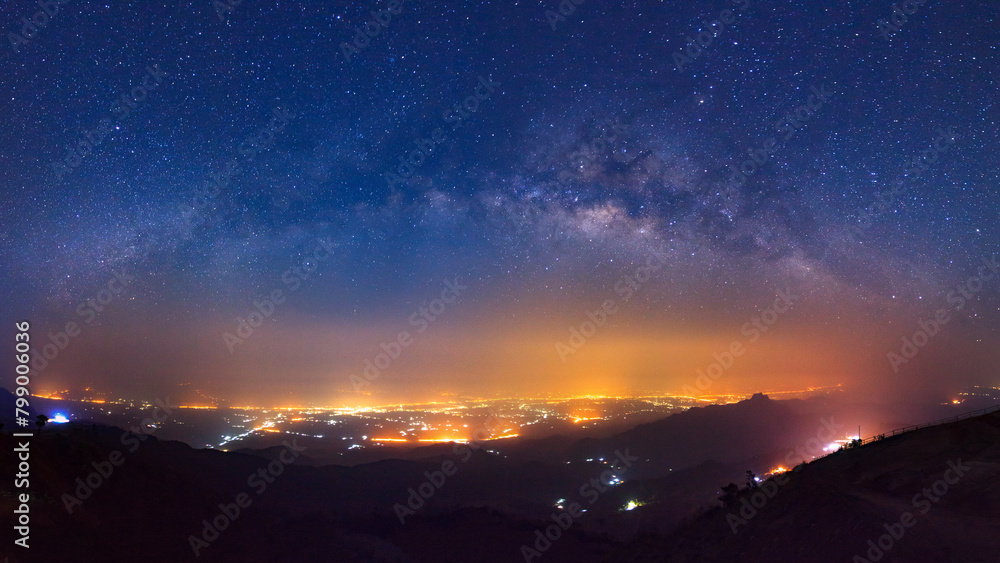 Panorama landscape silhouette tree on high moutain before sunrise with milky way galaxy