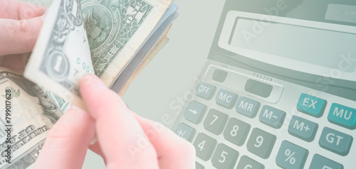 Man counts money. Calculato...