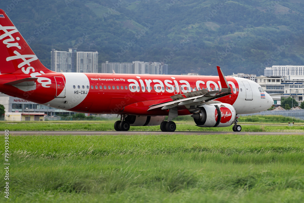 PENANG, MALAYSIA - MAY 2, 2023: Side view of an AirAsia aircraft in ...