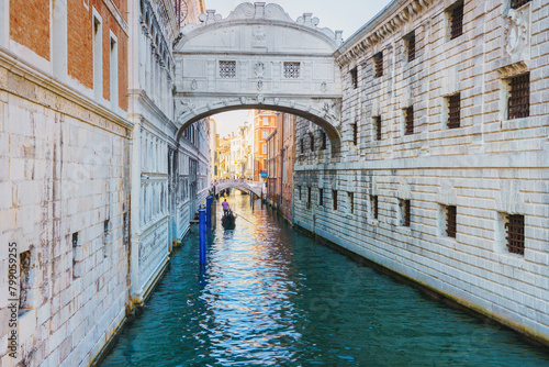 View of the gondolas of the Grand Canal on a sunny day in Venice, Italy. Bridge of Sighs. © Igor