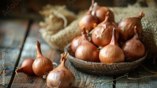 Bowl of onions on wooden surface