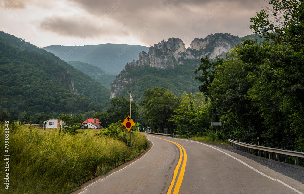 Mountain road in the mountains. Mountain road view Mountain road in the mountains. Mountain road view