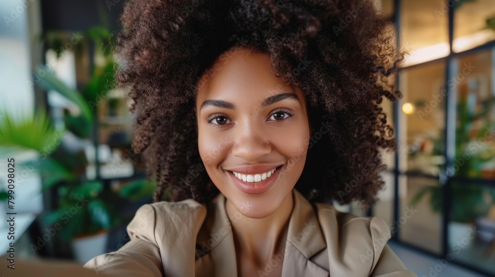 Obraz premium Businesswoman selfie and headshot with pleasant smile, new corporate job, and employee pleasure. Happy workplace, office, or online update on social media