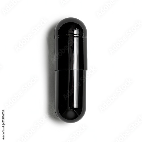 Black capsule. Dietary supplement. Medicine, vitamins, Omega 3, fish oil, activated charcoal. Isolated on white background.