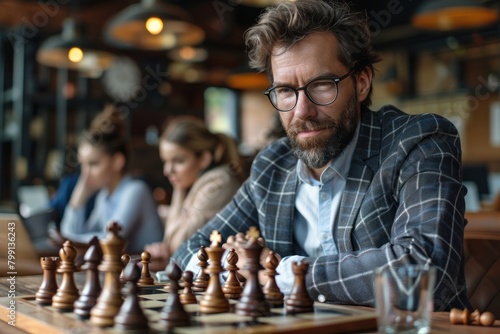A man with an intense gaze focusing on a chess game, contemplating his next strategic move in a high-stakes match.