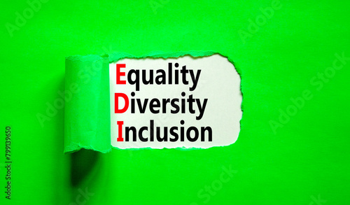 EDI equality diversity inclusion symbol. Concept words EDI equality diversity inclusion on white paper on beautiful green background. Business EDI equality diversity inclusion concept. Copy space.