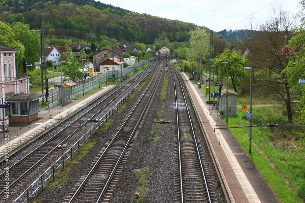 Fototapeta premium Image of a small railway station in Germany view and a road bridge.
