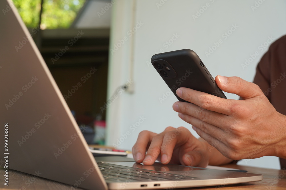 Portrait of Asian male manager working using laptop computer in modern office Male employee sitting at office and using PC See the keyboard typing screen. Enjoy working remotely Portrait of Asian male manager working using laptop computer in modern office Male employee sitting at office and using PC See the keyboard typing screen. Enjoy working remotely
