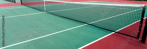 Tennis court with netting, close-up. Sport background